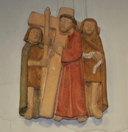 Jésus est chargé de sa croix